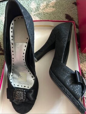 BCBGirls Black Sparkle Peep-Toe Heels with Bow and Rhinestone Accent